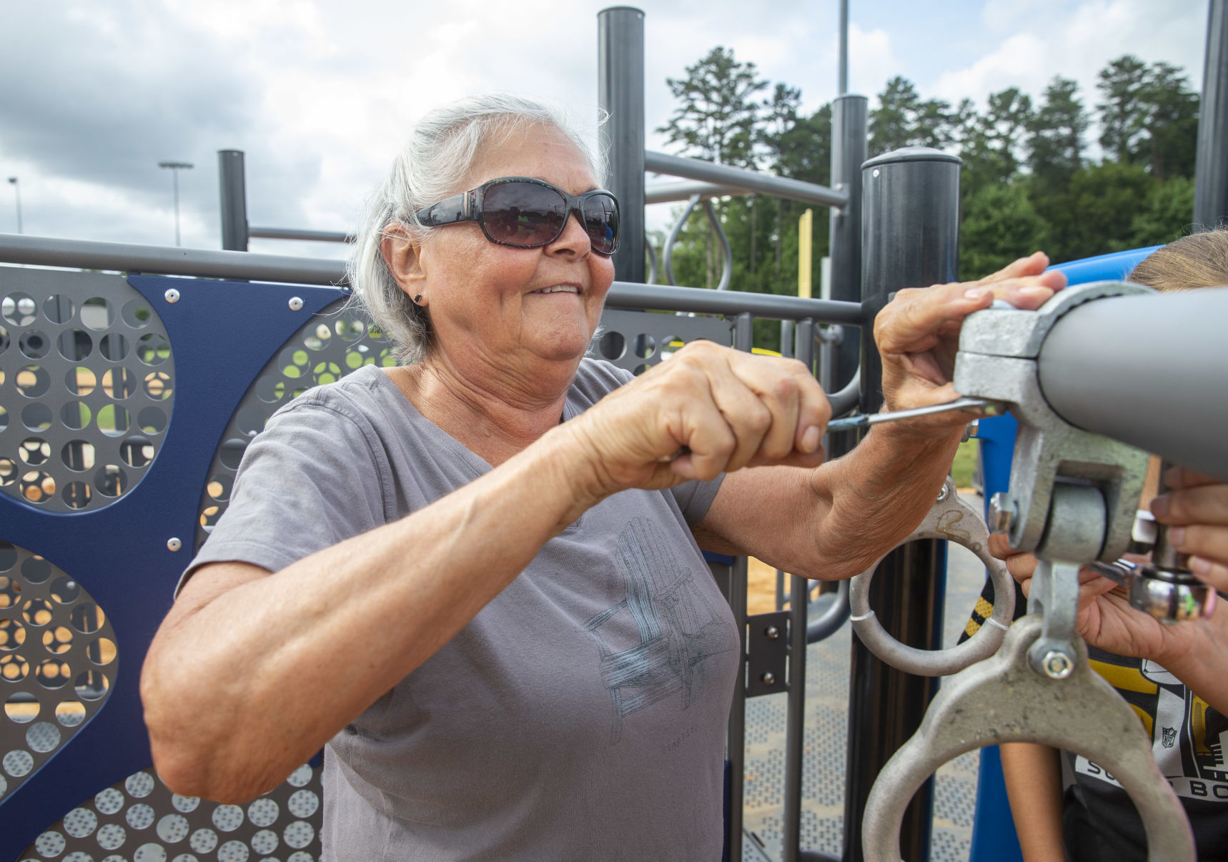 Volunteers assemble playground